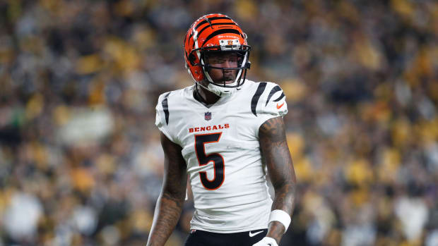 Dec 23, 2023; Pittsburgh, Pennsylvania, USA; Cincinnati Bengals wide receiver Tee Higgins (5) at the line of scrimmage against the Pittsburgh Steelers during the second quarter at Acrisure Stadium. Mandatory Credit: Charles LeClaire-USA TODAY Sports  