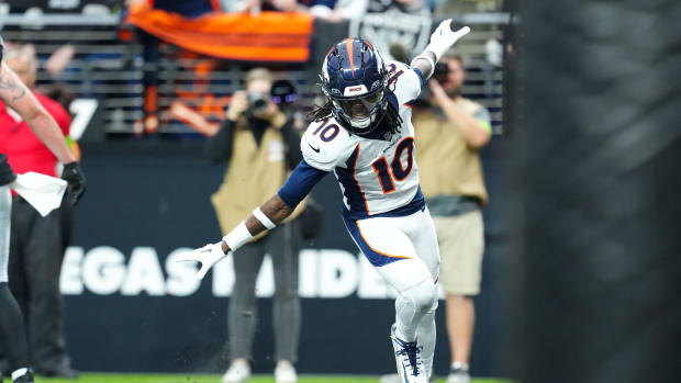Denver Broncos wide receiver Jerry Jeudy (10) celebrates after scoring a touchdown against the Las Vegas Raiders during the second quarter at Allegiant Stadium.