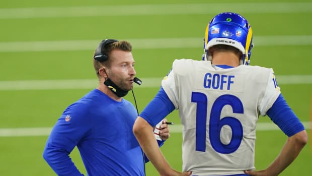 Sep 13, 2020; Inglewood, California, USA; Los Angeles Rams coach Sean McVay talks with quarterback Jared Goff (16) in the second half against the Dallas Cowboys at SoFi Stadium. The Rams defeated the Cowboys 20-17.