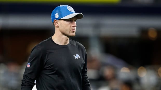 Detroit Lions offensive coordinator Ben Johnson watches warm up before the Dallas Cowboys game at AT&T Stadium in Arlington, Texas on Saturday, Dec. 30, 2023.