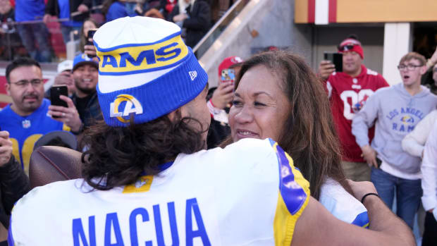 Jan 7, 2024; Santa Clara, California, USA; Los Angeles Rams wide receiver Puka Nacua (left) talks with his mother Penina (right) after defeating the San Francisco 49ers at Levi's Stadium.