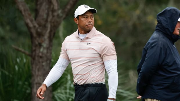 Dec 16, 2023; Orlando, Florida, USA; Tiger Woods walks on the seventh hole during the PNC Championship at The Ritz-Carlton Golf Club. Mandatory Credit: Reinhold Matay-USA TODAY Sports