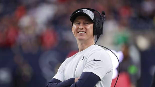 Houston Texans offensive coordinator Bobby Slowik smiles before the game against the Cleveland Browns at NRG Stadium.