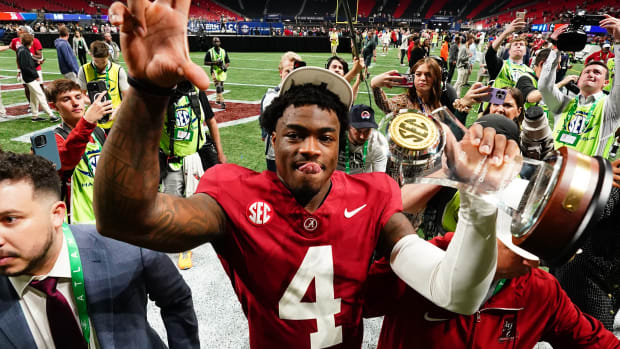 Alabama Crimson Tide quarterback Jalen Milroe (4) leaves the field after defeating the Georgia Bulldogs in the SEC Championship at Mercedes-Benz Stadium.