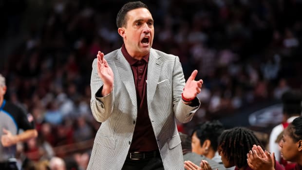 Mississippi State Bulldogs head coach Sam Purcell celebrates a play against the South Carolina Gamecocks in the first half at Colonial Life Arena.