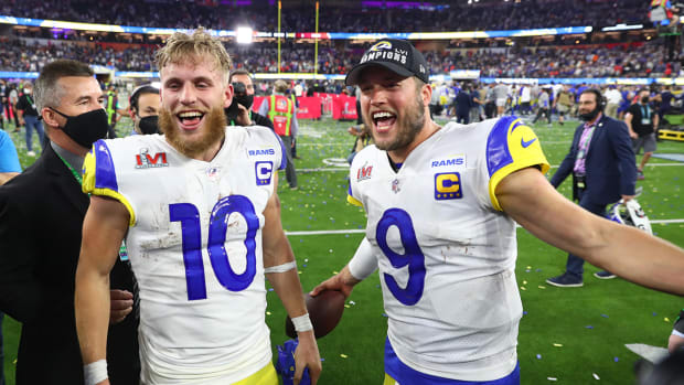Los Angeles Rams wide receiver Cooper Kupp (10) and quarterback Matthew Stafford (9) celebrate after defeating the Cincinnati Bengals in Super Bowl LVI at SoFi Stadium. 