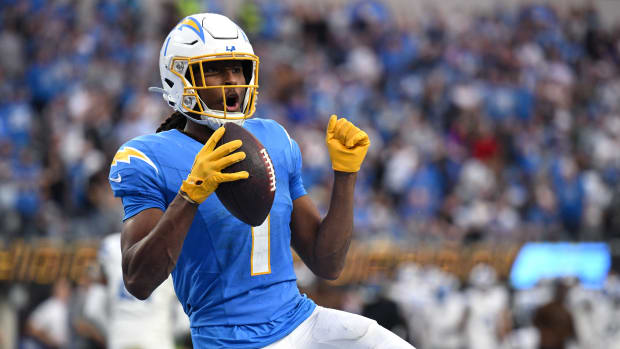 Nov 12, 2023; Inglewood, California, USA; Los Angeles Chargers wide receiver Quentin Johnston (1) celebrates after scoring a touchdown against the Detroit Lions during the second half at SoFi Stadium. Mandatory Credit: Orlando Ramirez-USA TODAY Sports  