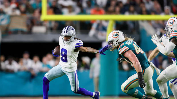 Dec 24, 2023; Miami Gardens, Florida, USA; Dallas Cowboys wide receiver KaVontae Turpin (9) runs with the football against Miami Dolphins linebacker Andrew Van Ginkel (43) during the fourth quarter at Hard Rock Stadium.