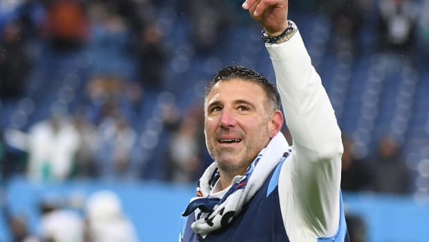 Jan 2, 2022; Nashville, Tennessee, USA; Tennessee Titans head coach Mike Vrabel celebrates as he leaves the field following a win against the Miami Dolphins at Nissan Stadium.