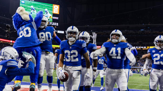 Dec 16, 2023; Indianapolis, Indiana, USA; Indianapolis Colts safety Julian Blackmon (32) celebrates his interception with teammates in the second half against the Pittsburgh Steelers at Lucas Oil Stadium.