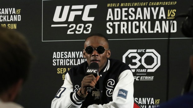 Israel Adesanya addresses media members following his UFC 293 loss against Sean Strickland.