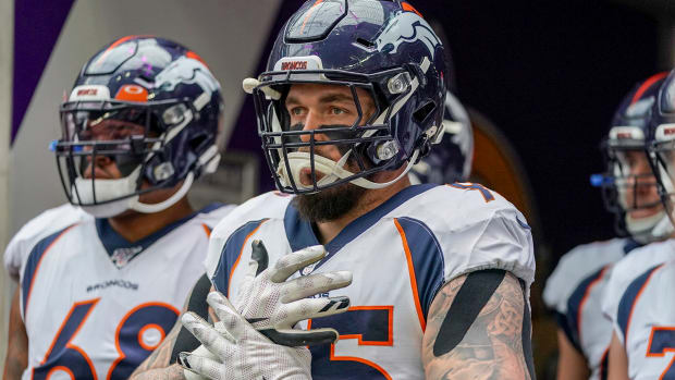 Derek Wolfe stands before a game in his Broncos uniform.