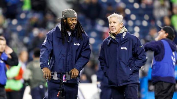 Sherman and Carroll before the Seahawks' 34-31 loss to the Falcons on Nov. 20, 2017.