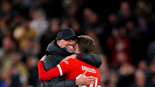 Liverpool manager Jurgen Klopp pictured hugging right-back Conor Bradley after a 2-1 win over Fulham in January 2024