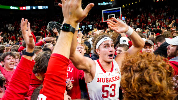 The Nebraska Cornhuskers celebrate after defeating the Purdue Boilermakers at Pinnacle Bank Arena.