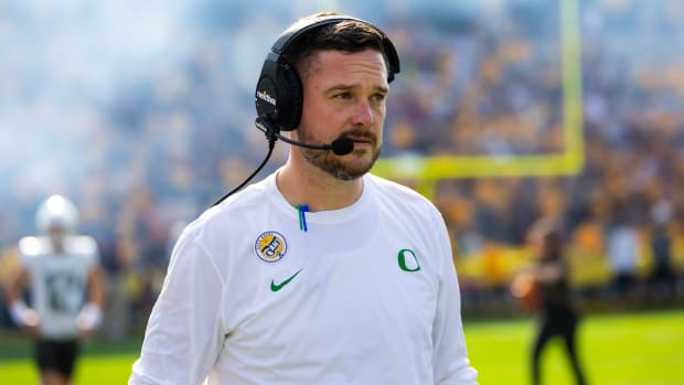 Oregon Ducks head coach Dan Lanning looks on from the sideline during a game against the Arizona State Sun Devils.