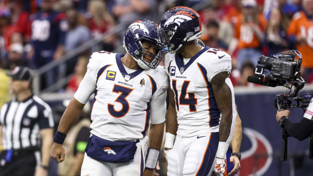 Denver Broncos quarterback Russell Wilson (3) and wide receiver Courtland Sutton (14) celebrate after a touchdown during the third quarter against the Houston Texans at NRG Stadium.