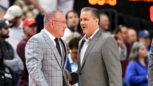 Jan 19, 2022; College Station, Texas, USA; Kentucky Wildcats head coach John Calipari and Texas A&M Aggies head coach Buzz Williams talk prior to the start of the game at Reed Arena. Mandatory Credit: Maria Lysaker-USA TODAY Sports