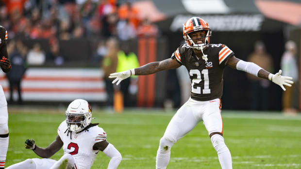 Nov 5, 2023; Cleveland, Ohio, USA; Cleveland Browns cornerback Denzel Ward (21) celebrates his broken up pass intended for Arizona Cardinals wide receiver Marquise Brown (2) during the third quarter at Cleveland Browns Stadium.