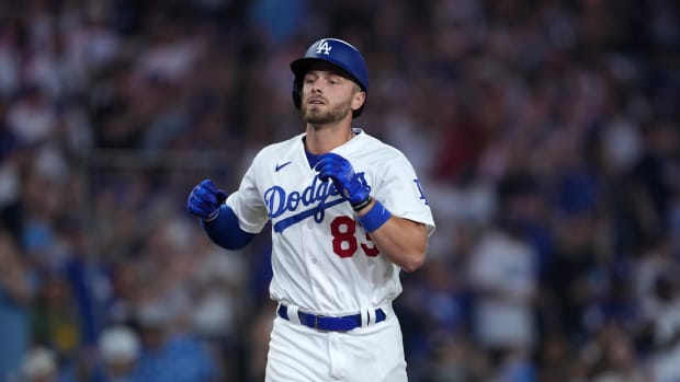 Aug 31, 2023; Los Angeles, California, USA; Los Angeles Dodgers third baseman Michael Busch (83) runs the bases after hitting a home run in the seventh inning against the Atlanta Braves at Dodger Stadium. Mandatory Credit: Kirby Lee-USA TODAY Sports