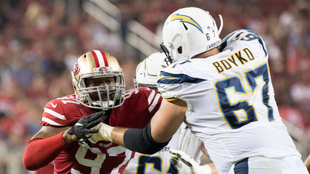 August 31, 2017; Santa Clara, CA, USA; San Francisco 49ers linebacker Dekoda Watson (97) rushes Los Angeles Chargers offensive guard Brett Boyko (67) during the second quarter at Levi's Stadium. The 49ers defeated the Chargers 23-13. Mandatory Credit: Kyle Terada-USA TODAY Sports  