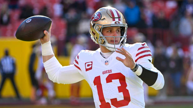 Dec 31, 2023; Landover, Maryland, USA; San Francisco 49ers quarterback Brock Purdy (13) warms up before the game against the Washington Commanders at FedExField. Mandatory Credit: Brad Mills-USA TODAY Sports  