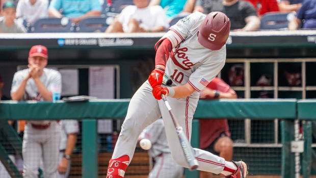 Jun 17, 2023; Omaha, NE, USA; Stanford Cardinal catcher Malcolm Moore (10) hits a single against the Wake Forest Demon Deacons during the sixth inning at Charles Schwab Field Omaha. Mandatory Credit: Dylan Widger-USA TODAY Sports