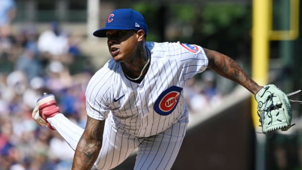 Cubs pitcher Marcus Stroman throws a pitch during a game in 2023.