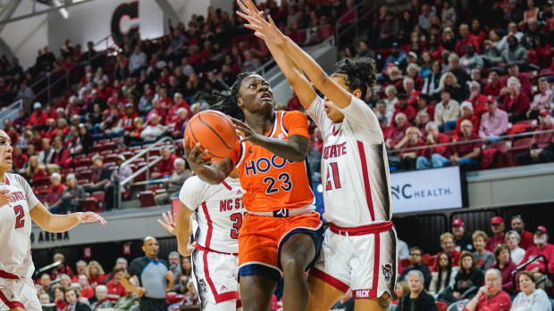 Alexia Smith shoots the ball over her defender during the Virginia women's basketball game at NC State.