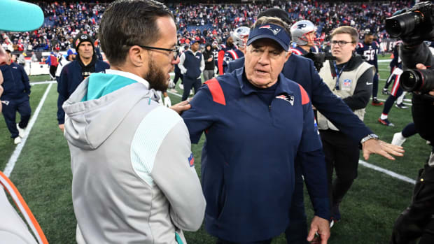 Jan 1, 2023; Foxborough, Massachusetts, USA; New England Patriots head coach Bill Belichick shakes hands with Miami Dolphins head coach Mike McDaniel after a game at Gillette Stadium. Mandatory Credit: Brian Fluharty-USA TODAY Sports  