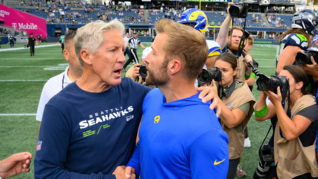 Sep 10, 2023; Seattle, Washington, USA; Seattle Seahawks head coach Pete Carroll and Los Angeles Rams head coach Sean McVay shake hands after the game at Lumen Field.