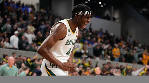 Jan 9, 2024; Waco, Texas, USA; Baylor Bears guard Ja'Kobe Walter (4) reacts after a forcing a turnover against the Brigham Young Cougars during the first half at Paul and Alejandra Foster Pavilion. Mandatory Credit: Chris Jones-USA TODAY Sports