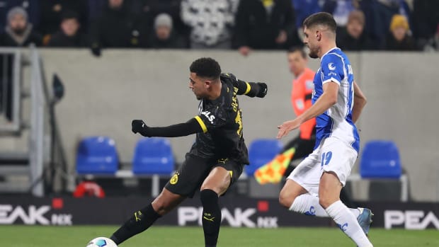 Jadon Sancho pictured (left) in action for Borussia Dortmund during a 3-0 win over Darmstadt in the German Bundesliga in January 2024