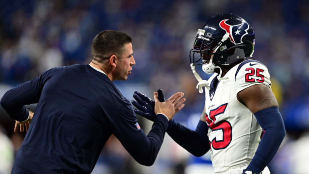 King and a coach during the Texans' 23-19 win over the Colts on Jan. 6, 2024.
