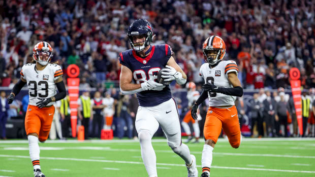 Jan 13, 2024; Houston, Texas, USA; Houston Texans tight end Dalton Schultz (86) scores a touch down during the second quarter in a 2024 AFC wild card game at NRG Stadium. Mandatory Credit: Troy Taormina-USA TODAY Sports