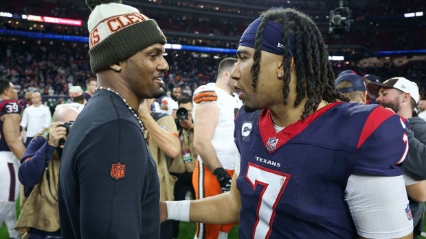 Deshaun Watson and C.J. Stroud greet each other on the field after a 2024 AFC wild-card game