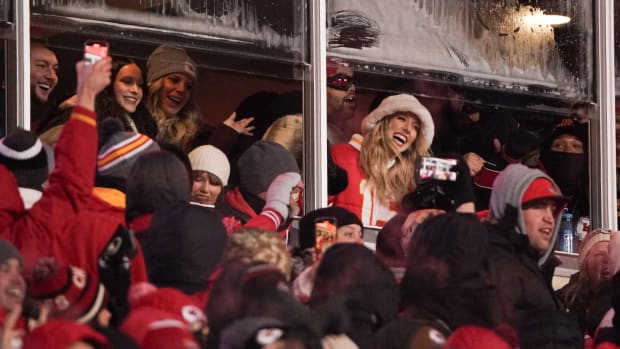 Jan 13, 2024; Kansas City, Missouri, USA; Recording artist Taylor Swift and Brittany Mahomes watch game action between the Kansas City Chiefs and Miami Dolphins during the second half of the 2024 AFC wild card game at GEHA Field at Arrowhead Stadium. Mandatory Credit: Denny Medley-USA TODAY Sports