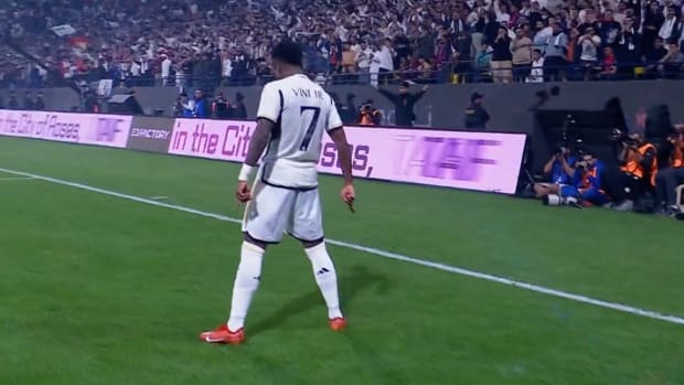 Vinicius Junior pictured performing Cristiano Ronaldo's 'SIU' celebration after scoring a goal for Real Madrid against Barcelona in the final of the Supercopa de Espana in January 2024