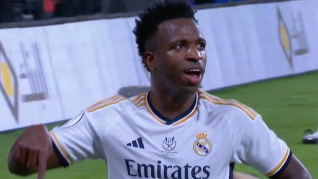 Vinicius Junior pictured celebrating after scoring a hat-trick for Real Madrid against Barcelona in the final of the Supercopa de Espana in January 2024