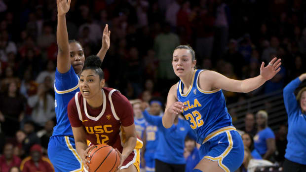 UCLA Bruins guard Charisma Osborne and forward Angela Dugalic USC Trojans guard JuJu Watkins women's basketball