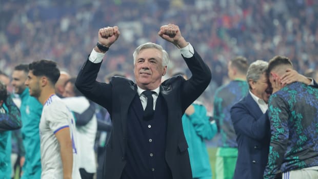 Manager Carlo Ancelotti pictured celebrating after leading Real Madrid to victory in the 2022 UEFA Champions League final