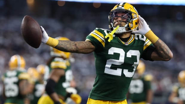 Green Bay Packers cornerback Jaire Alexander (23) reacts after an interception against the Dallas Cowboys in the first half of the 2024 NFC wild card game at AT&T Stadium.