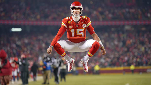 Kansas City Chiefs quarterback Patrick Mahomes jumping in the air
