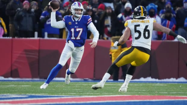 Jan 15, 2024; Orchard Park, New York, USA; Buffalo Bills quarterback Josh Allen (17) looks the play th ball pressured by Pittsburgh Steelers linebacker Alex Highsmith (56) in the first quarter in a 2024 AFC wild card game at Highmark Stadium. Mandatory Credit: Kirby Lee-USA TODAY Sports  