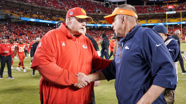 Kansas City Chiefs head coach Andy Reid shakes hands with Denver Broncos head coach Sean Payton after the game at GEHA Field at Arrowhead Stadium.