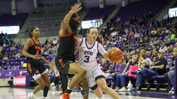 Madison Conner drives to the basket versus Oklahoma State.