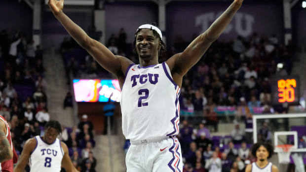 Jan 10, 2024; Fort Worth, Texas, USA; TCU Horned Frogs forward Emanuel Miller (2) reacts after scoring a three point basket against the Oklahoma Sooners during the second half at Ed and Rae Schollmaier Arena. Mandatory Credit: Chris Jones-USA TODAY Sports