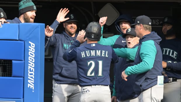 Apr 7, 2023; Cleveland, Ohio, USA; Seattle Mariners designated hitter Cooper Hummel (21) celebrates after scoring during the fifth inning against the Cleveland Guardians at Progressive Field. Mandatory Credit: Ken Blaze-USA TODAY Sports