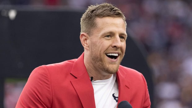 Former Houston Texans defensive end J.J. Watt speaks to the fans during his Ring Of Honor Ceremony at halftime during the game between the Texans and Pittsburgh Steelers at NRG Stadium.