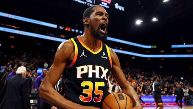 Phoenix Suns forward Kevin Durant (35) celebrates after beating the Sacramento Kings 119-117 at Footprint Center.